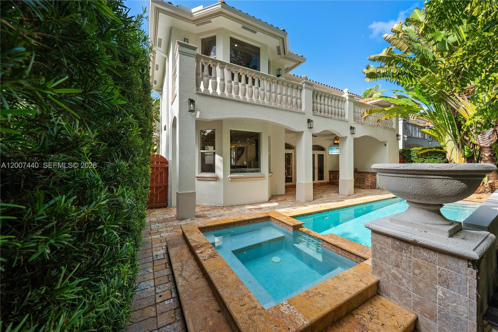 4065 Battersea Road Miami, FL 33133 - Photo 2 of 39 a view of a house with pool and sitting area