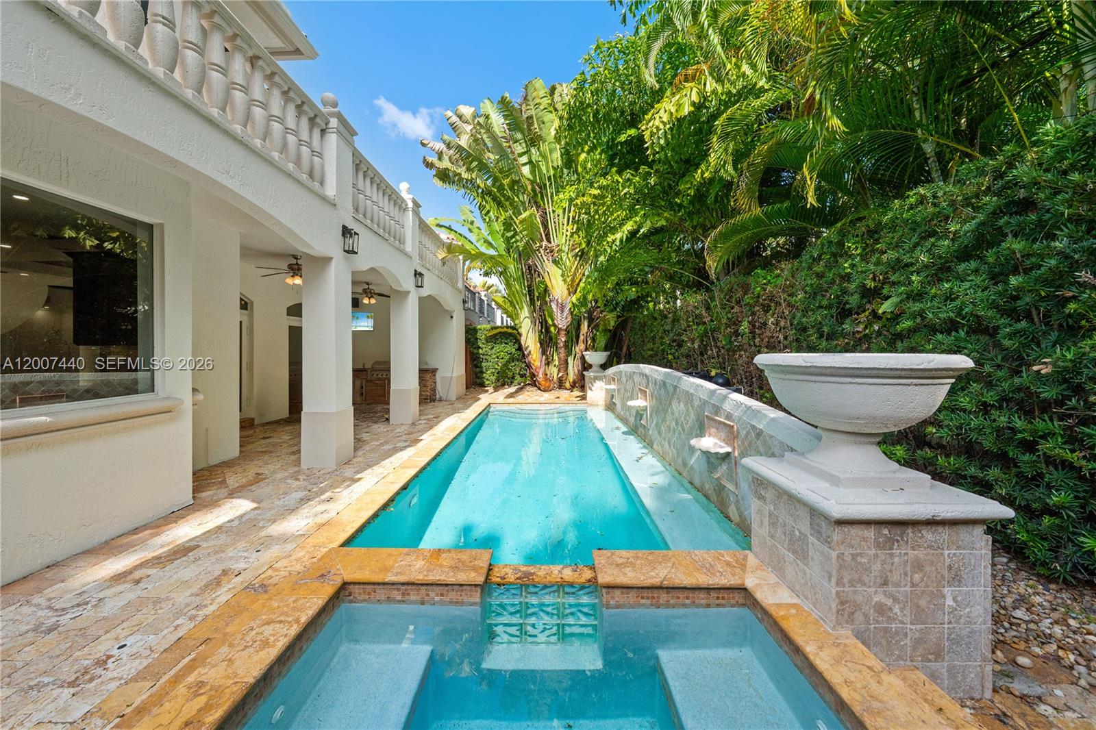 4065 Battersea Road Miami, FL 33133 - Photo 3 of 39 a view of a backyard with swimming pool