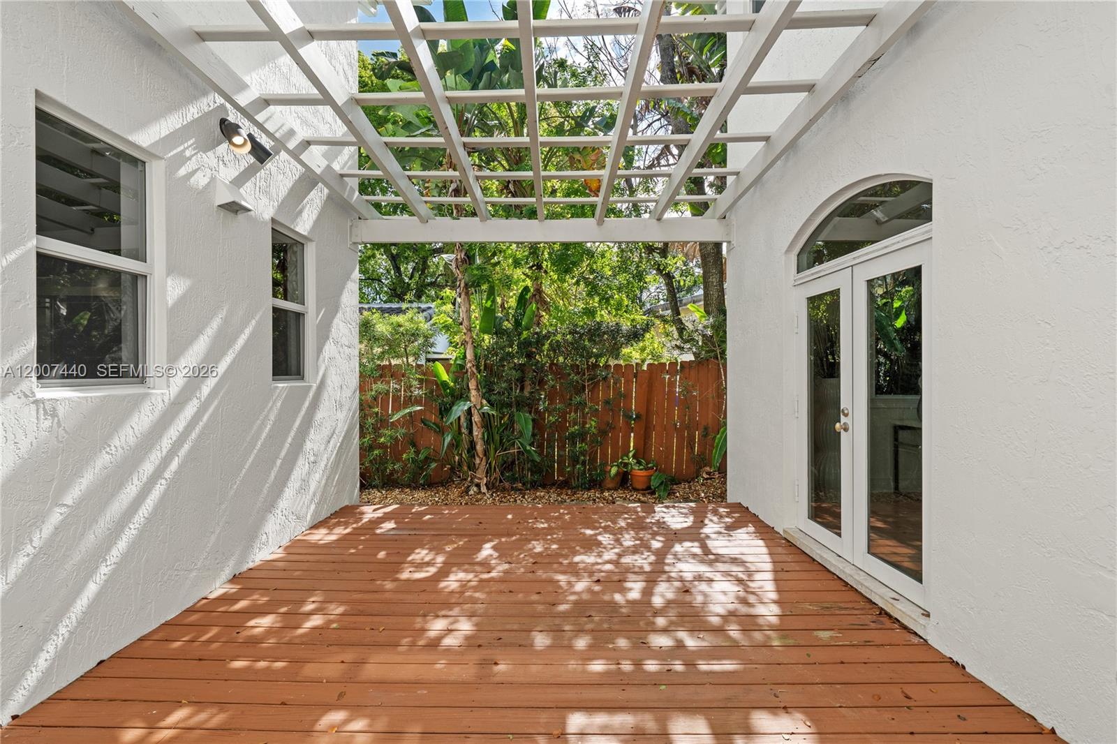 4065 Battersea Road Miami, FL 33133 - Photo 36 of 39 a view of a back yard from a building