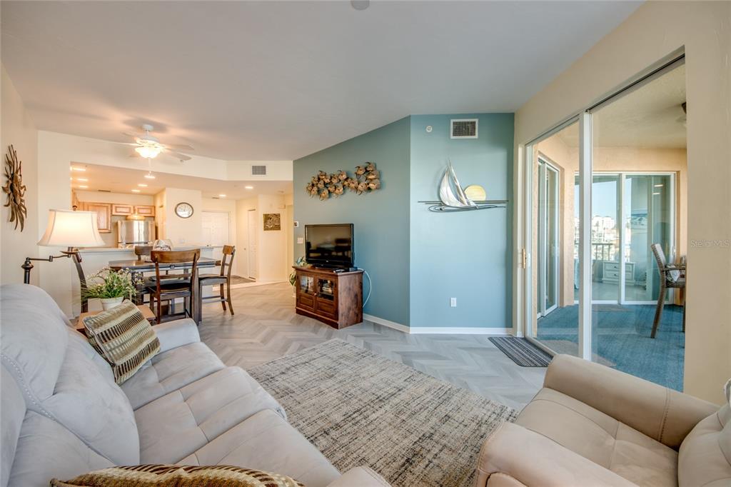 2090 Matecumbe Key Road, Unit 1202 Punta Gorda, FL 33955 - Photo 15 of 42 a living room with furniture and a table