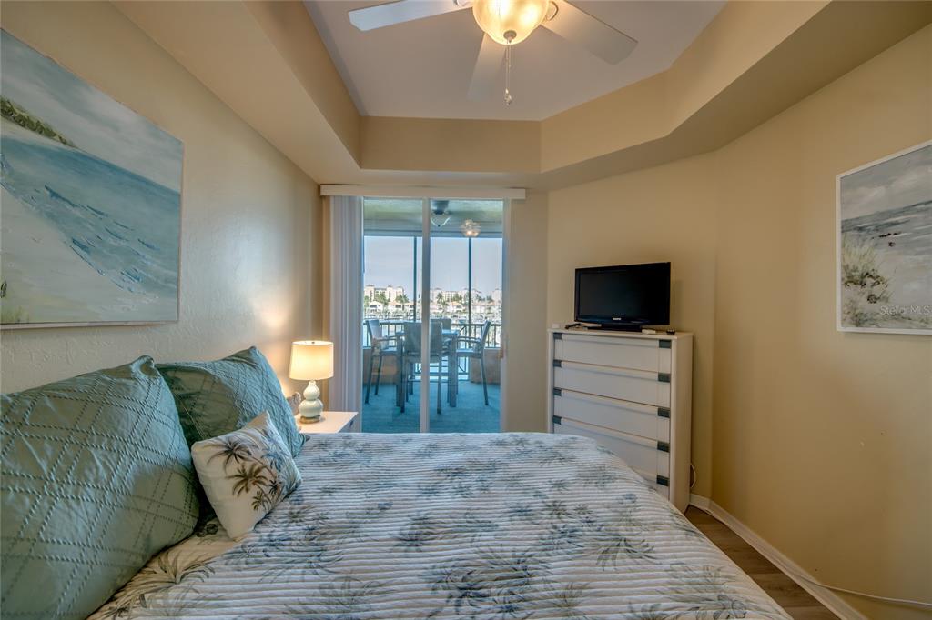 2090 Matecumbe Key Road, Unit 1202 Punta Gorda, FL 33955 - Photo 23 of 42 a living room with furniture and a flat screen tv