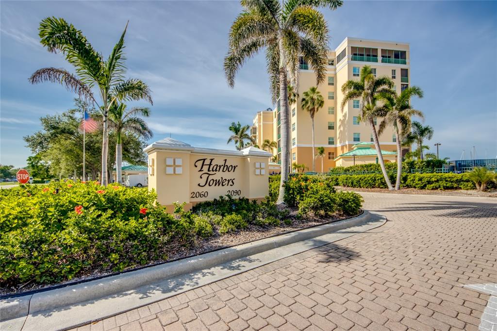 2090 Matecumbe Key Road, Unit 1202 Punta Gorda, FL 33955 - Photo 36 of 42 a sign on the side of a building