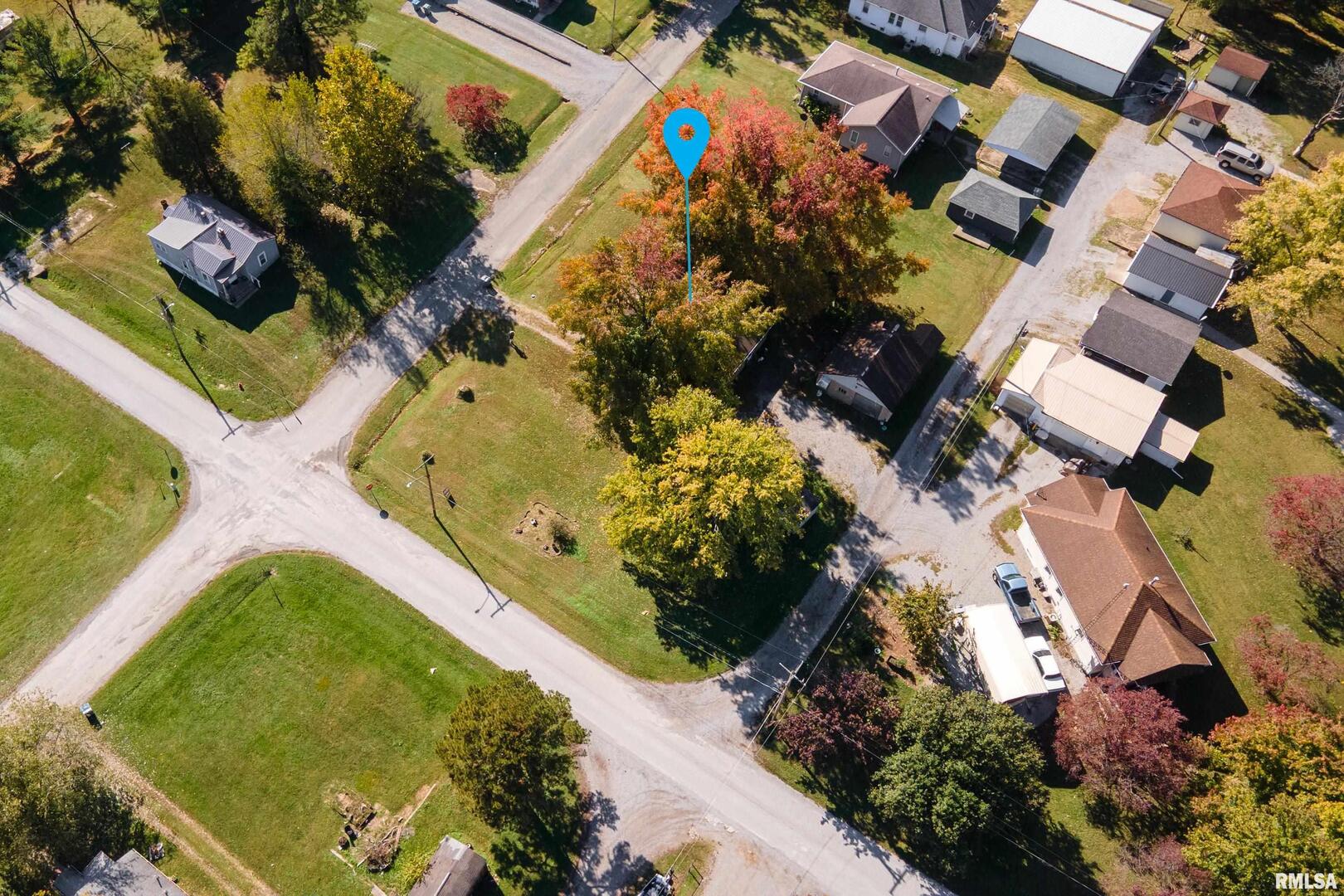 320 Franklin Avenue Orient, IL 62874 - Photo 21 of 26 an aerial view of a house with a yard