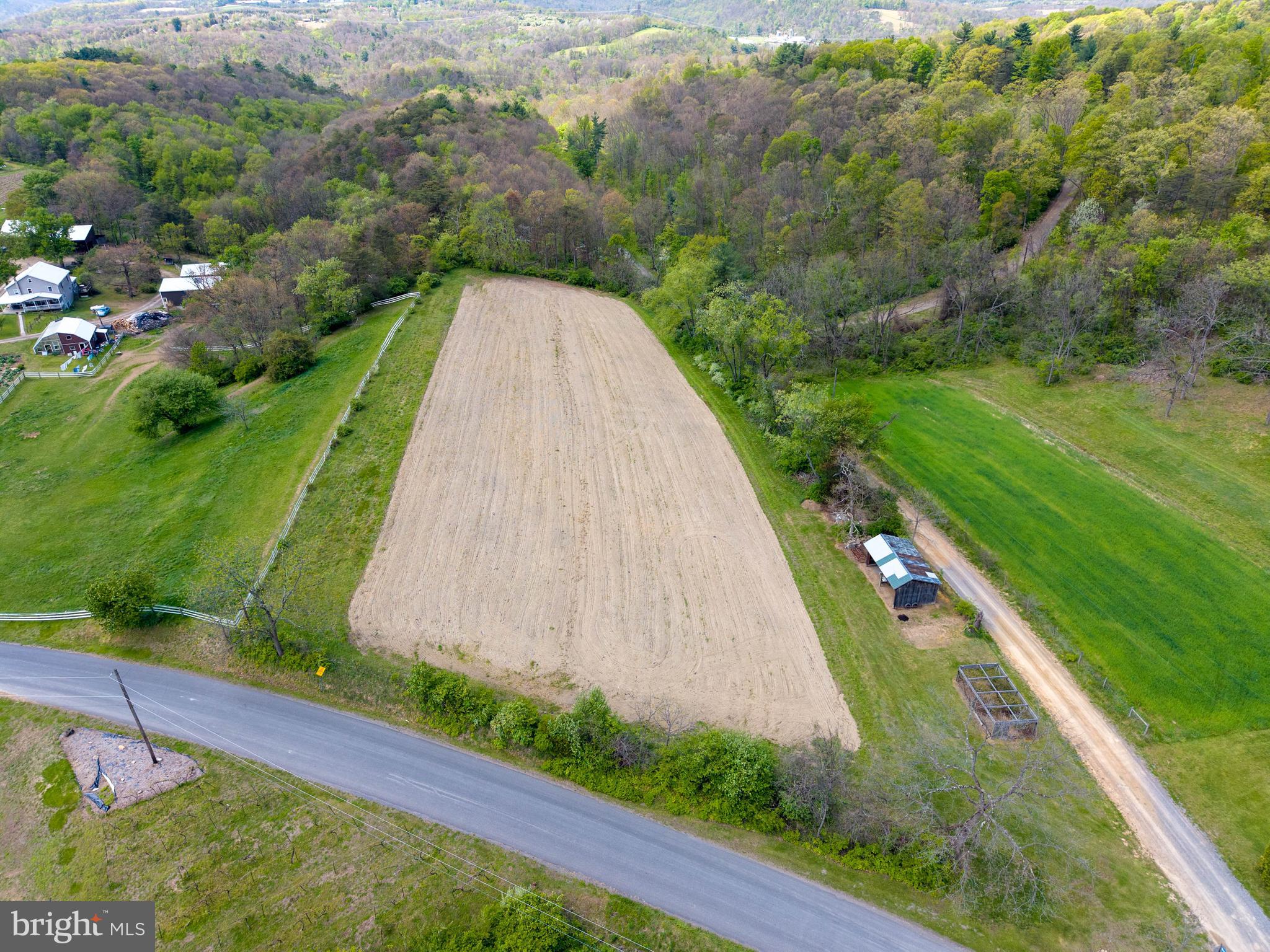 1020 Clark Hill Road Mount Pleasant Mills, PA 17853 - Photo 7 of 76 an aerial view of a residential houses with outdoor space