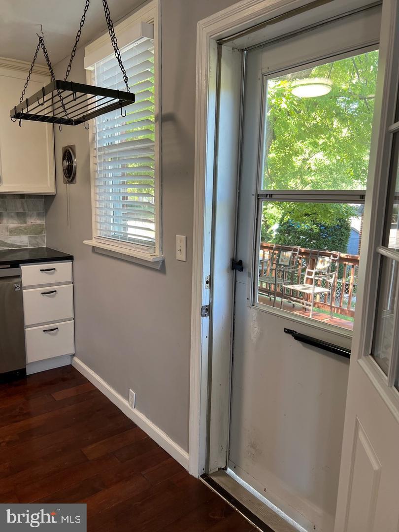 237 Miner Street Malvern, PA 19355 - Photo 12 of 28 a view of a kitchen with a window and wooden floor