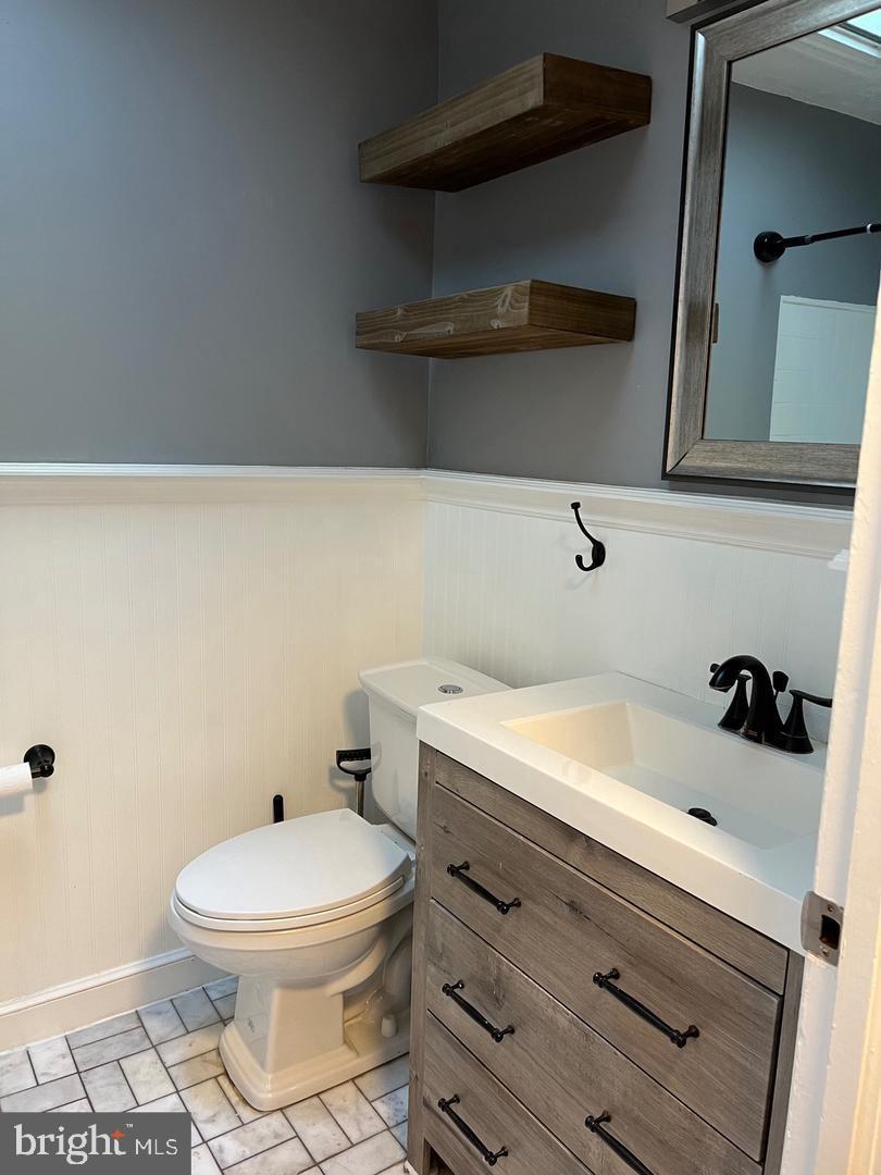 237 Miner Street Malvern, PA 19355 - Photo 15 of 28 a bathroom with a sink and a toilet