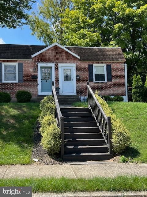 237 Miner Street Malvern, PA 19355 - Photo 2 of 28 a front view of house with yard and green space