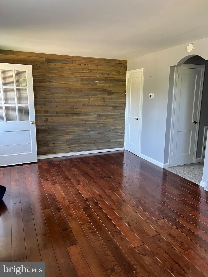 237 Miner Street Malvern, PA 19355 - Photo 4 of 28 a view of an empty room with wooden floor and a window