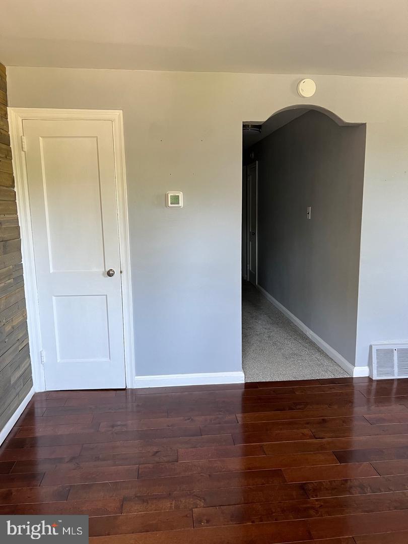 237 Miner Street Malvern, PA 19355 - Photo 5 of 28 an empty room with wooden floor and closet