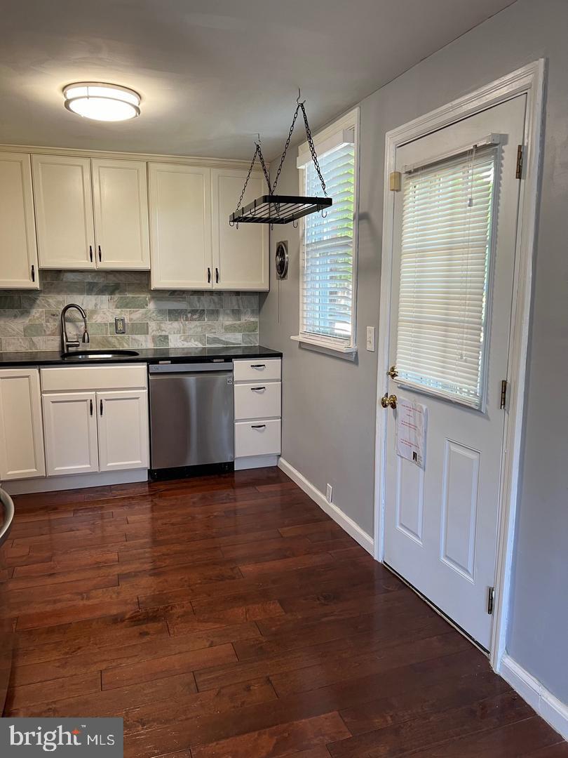 237 Miner Street Malvern, PA 19355 - Photo 9 of 28 a kitchen with granite countertop a sink and a stove