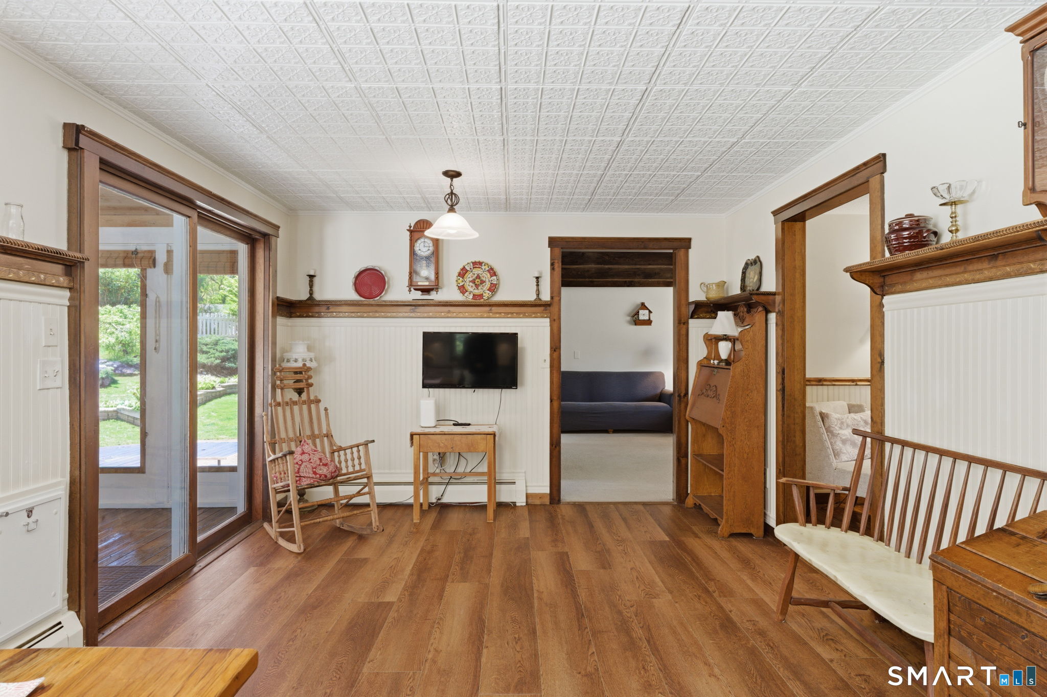 79 Buckboard Lane Bristol, CT 06010 - Photo 18 of 40 a living room with furniture and a wooden floor