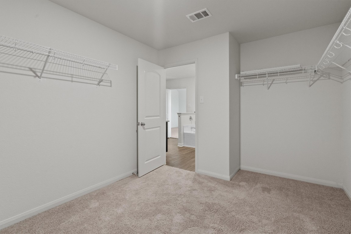 14405 Boomtown Way Elgin, TX 78621 - Photo 20 of 39 a view of an empty room