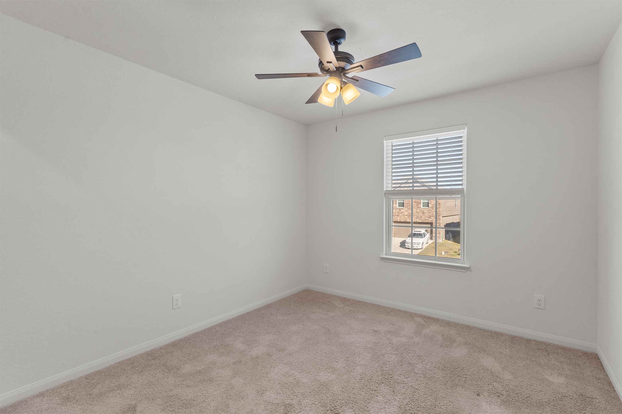 14405 Boomtown Way Elgin, TX 78621 - Photo 23 of 39 an empty room with a window