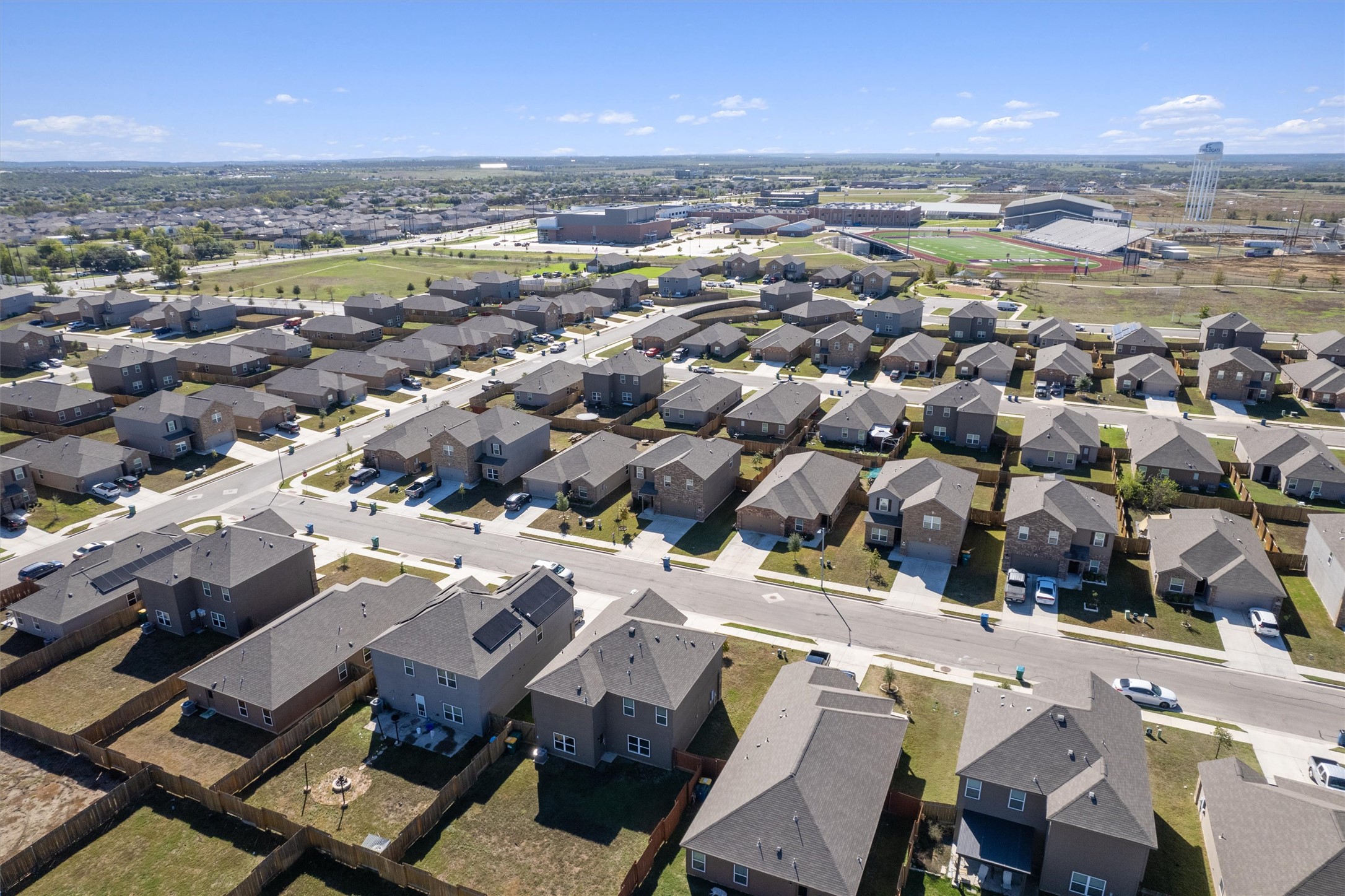 14405 Boomtown Way Elgin, TX 78621 - Photo 35 of 39 an aerial view of a city with lots of residential buildings