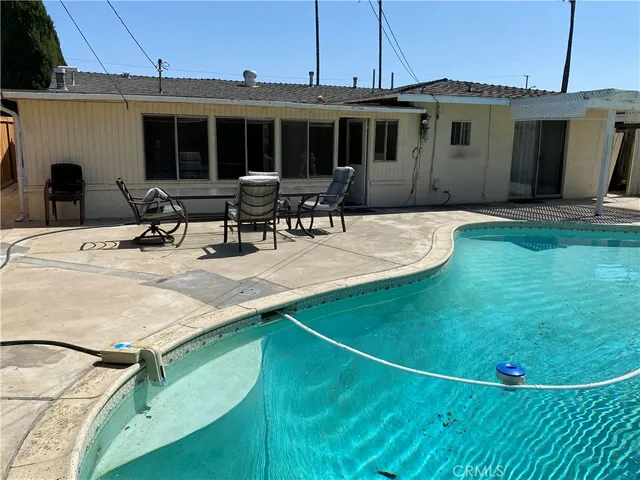 a view of a house with patio