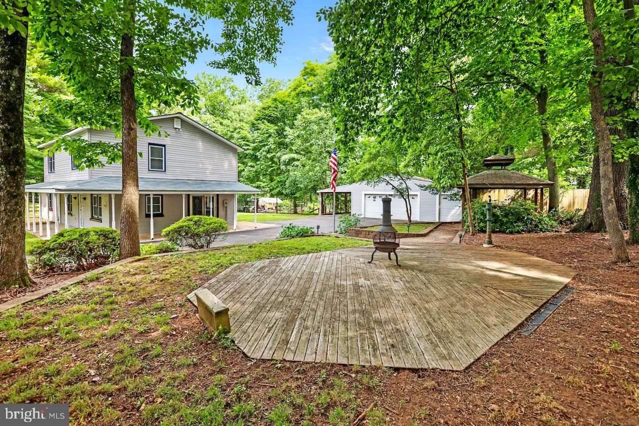 8820 McGrath Road Manassas, VA 20112 - Photo 24 of 28 Tree shaded deck and horse-shoe pit