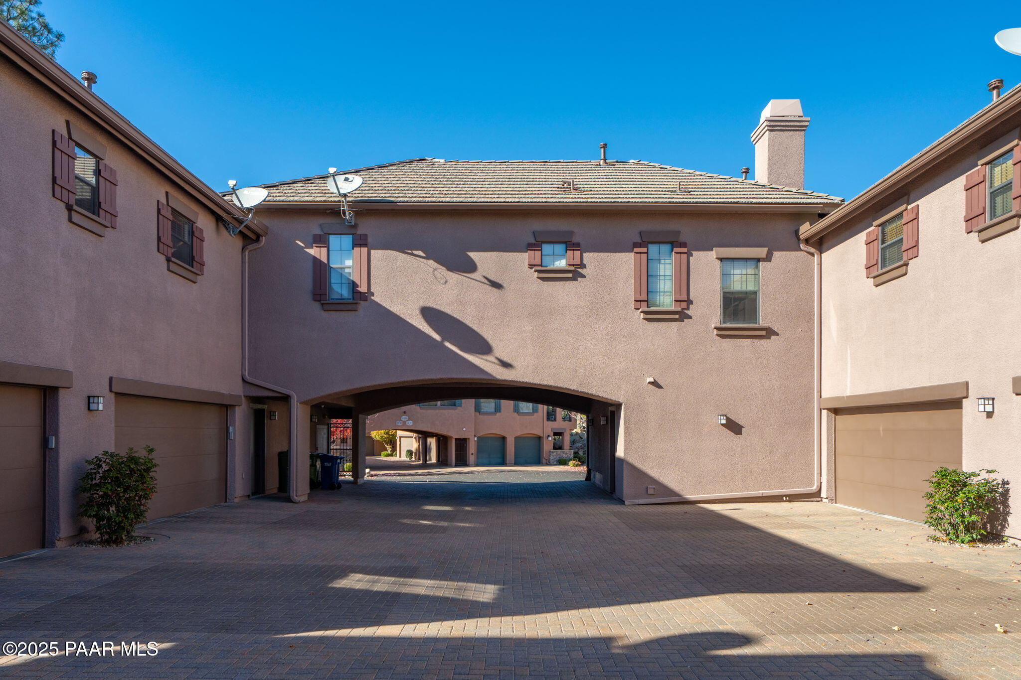 1716 Alpine Meadows Lane, Unit 305 Prescott, AZ 86303 - Photo 36 of 49 a front view of a house with a yard