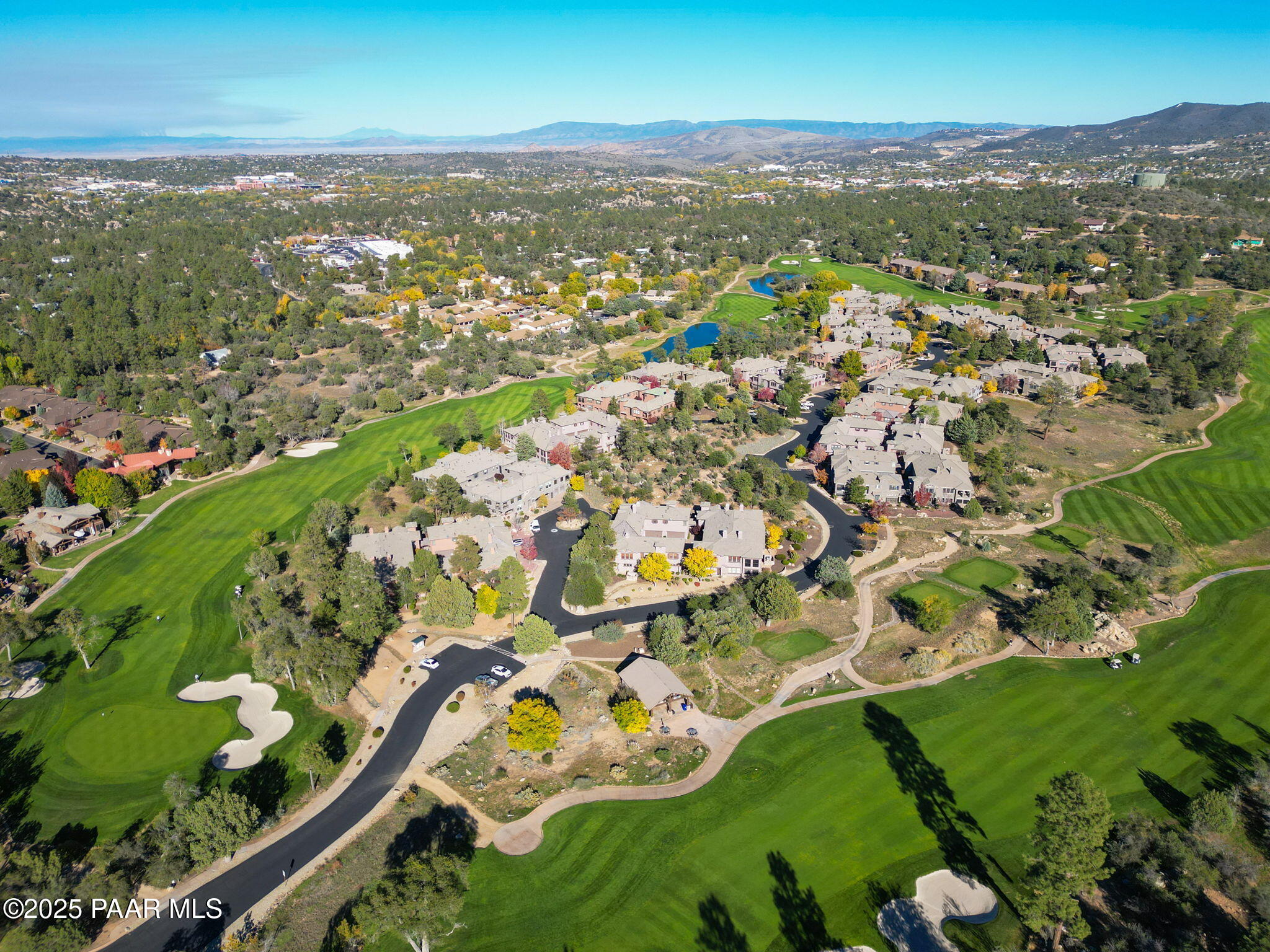 1716 Alpine Meadows Lane, Unit 305 Prescott, AZ 86303 - Photo 43 of 49 an aerial view of residential houses with outdoor space