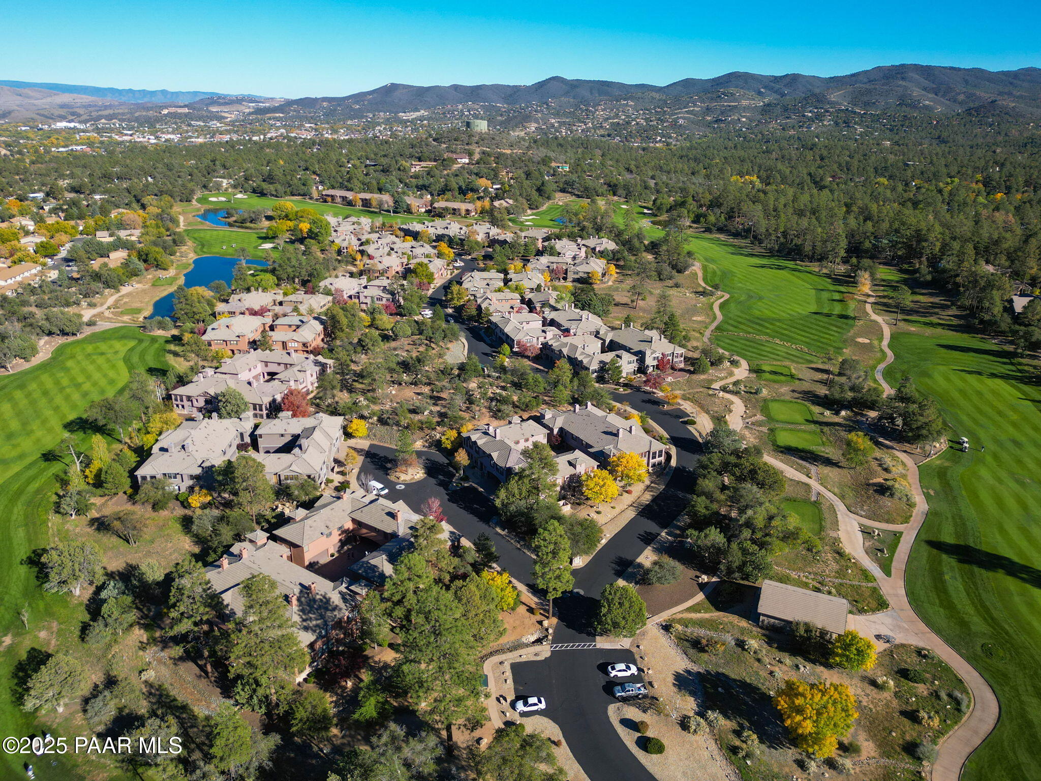 1716 Alpine Meadows Lane, Unit 305 Prescott, AZ 86303 - Photo 45 of 49 a view of a city with mountains in the background