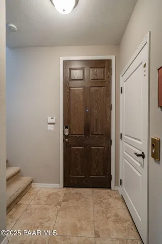 a view of a hallway with closet