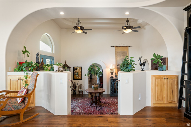 779 South Silver Road Leeds, UT 84746 - Photo 13 of 80 Entryway with dark wood-style floors, arched walkways, a high ceiling, and a ceiling fan