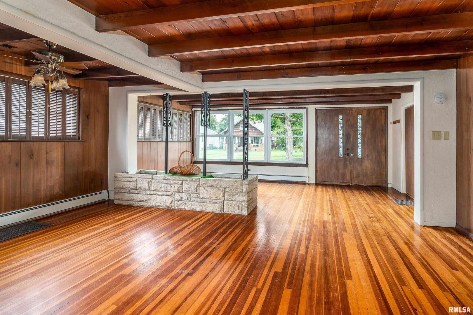 2120 Logan Street Murphysboro, IL 62966 - Photo 5 of 30 a view of outdoor room with wooden floor and fan