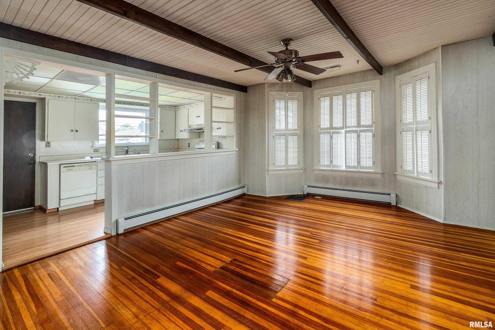 2120 Logan Street Murphysboro, IL 62966 - Photo 9 of 30 a view of empty room with wooden floor and fan