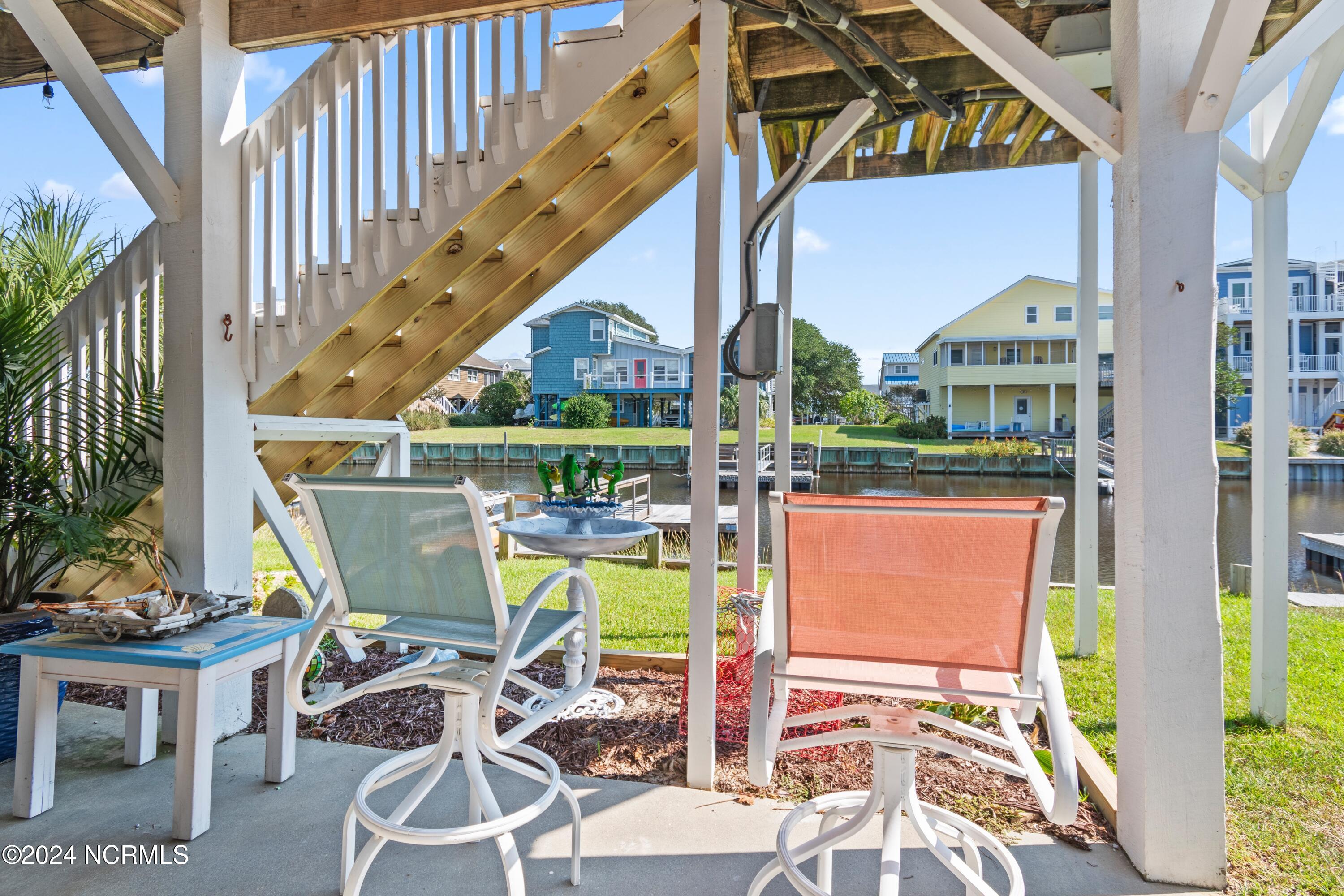 415 Sailfish Street Sunset Beach, NC 28468 - Photo 38 of 63 Canal front home makes it easy to enjoy the water!