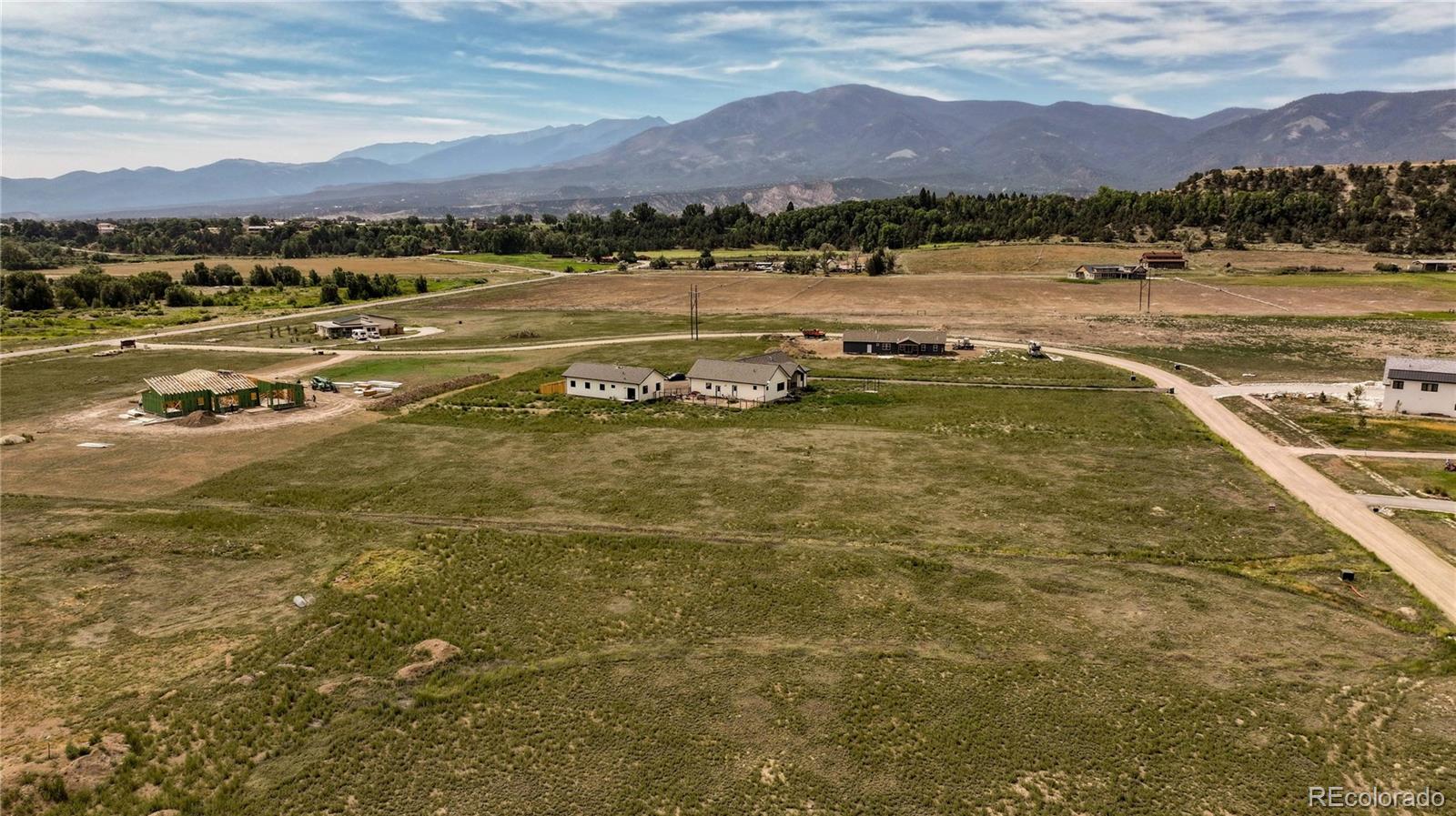8364 Longhorn Drive Salida, CO 81201 - Photo 9 of 13 a view of a lake with mountains in the background