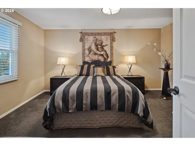 a bathroom with a double vanity sink and mirror