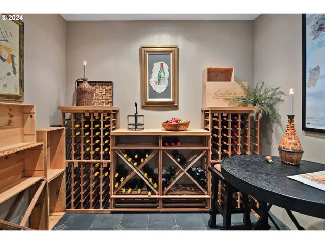 a view of a roof deck with table and chairs with wooden floor