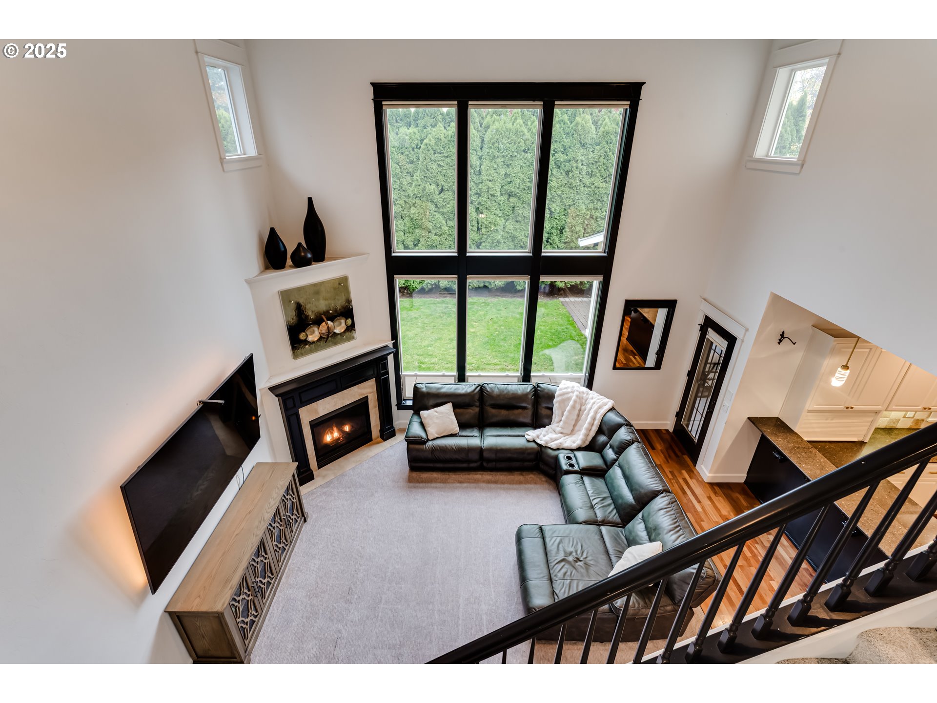 729 Aspen Street Springfield, OR 97477 - Photo 23 of 39 a living room with furniture and a floor to ceiling window