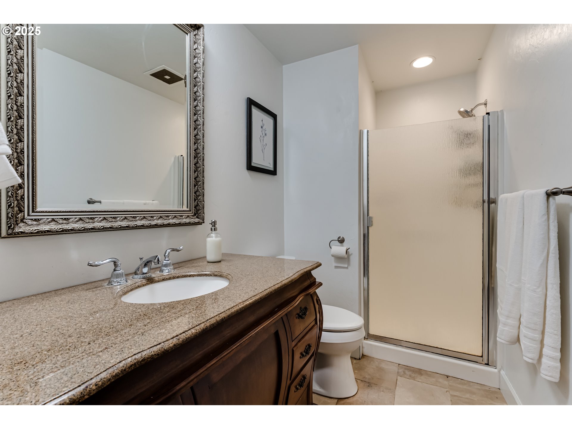 729 Aspen Street Springfield, OR 97477 - Photo 31 of 39 a bathroom with a granite countertop sink shower and a mirror