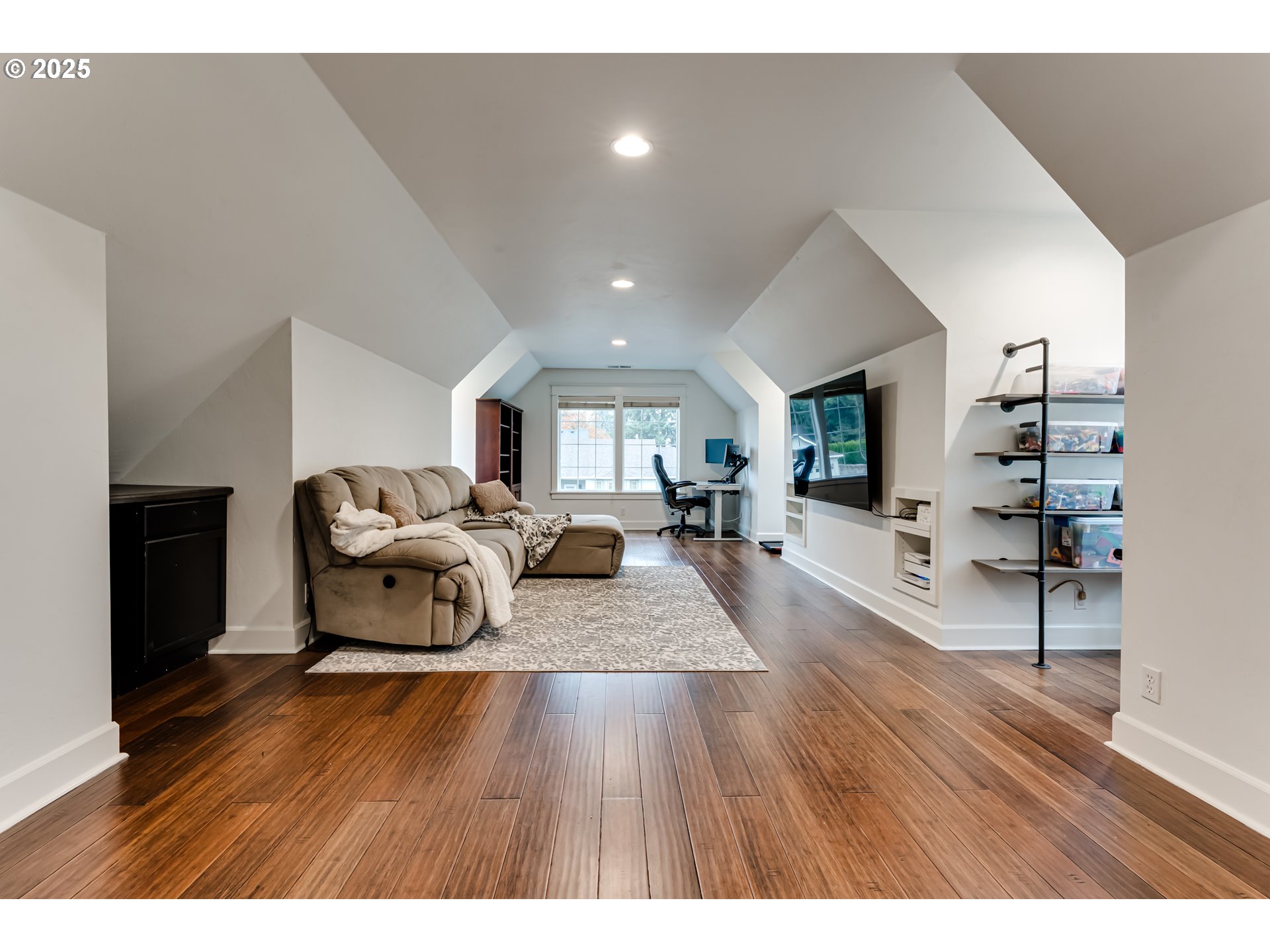 729 Aspen Street Springfield, OR 97477 - Photo 32 of 39 a living room with furniture and a wooden floor