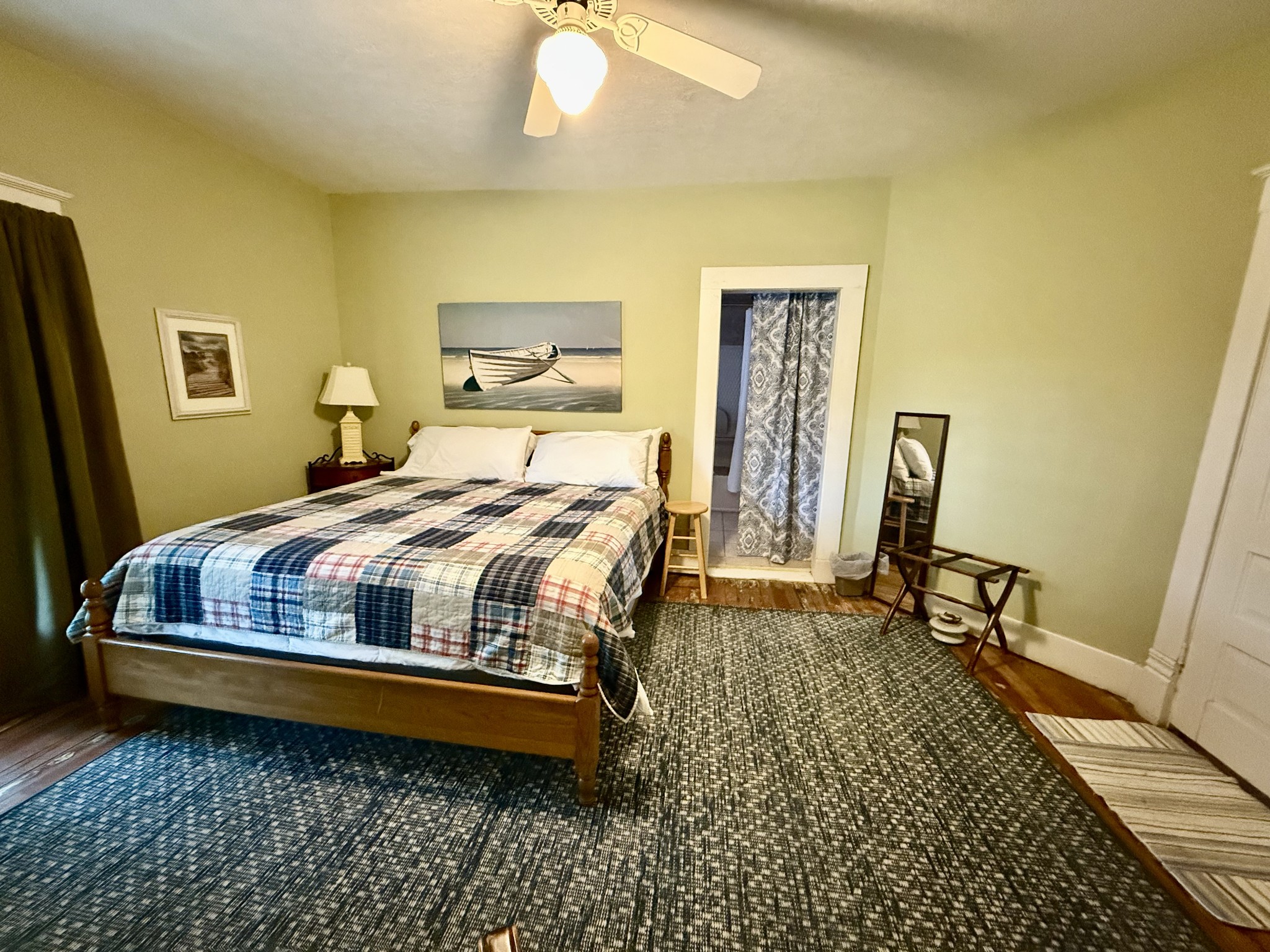 101 Webb Road East Bell Buckle, TN 37020 - Photo 43 of 74 a bedroom with a bed and wooden floor