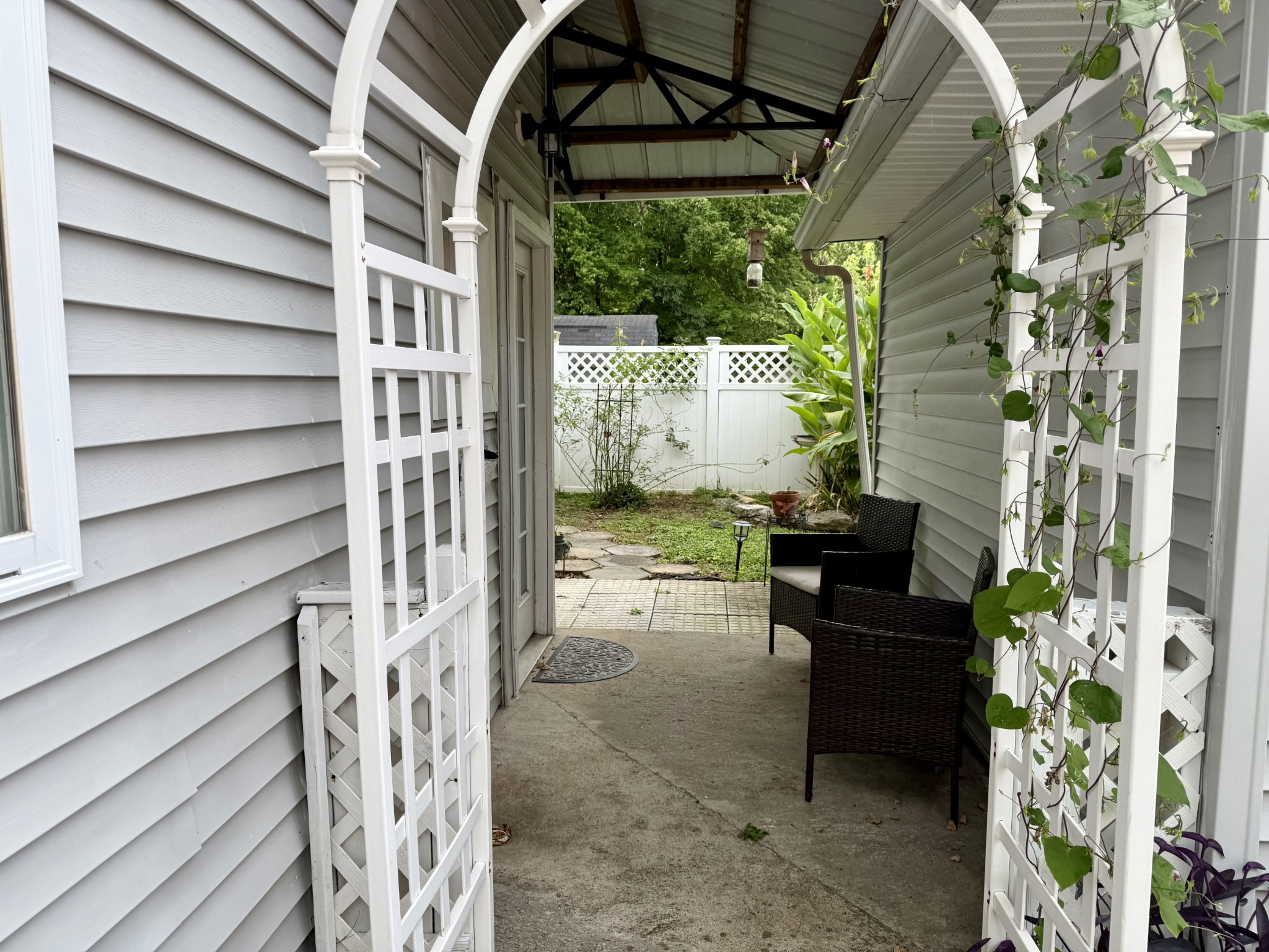 101 Webb Road East Bell Buckle, TN 37020 - Photo 60 of 74 a porch with a bench next to a yard