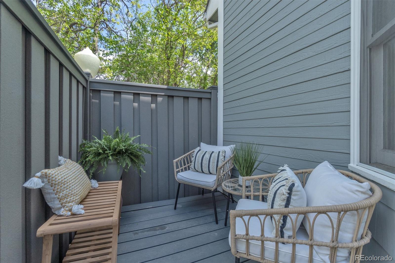1430 18th Street, Unit 9 Boulder, CO 80302 - Photo 3 of 16 a view of a deck with furniture