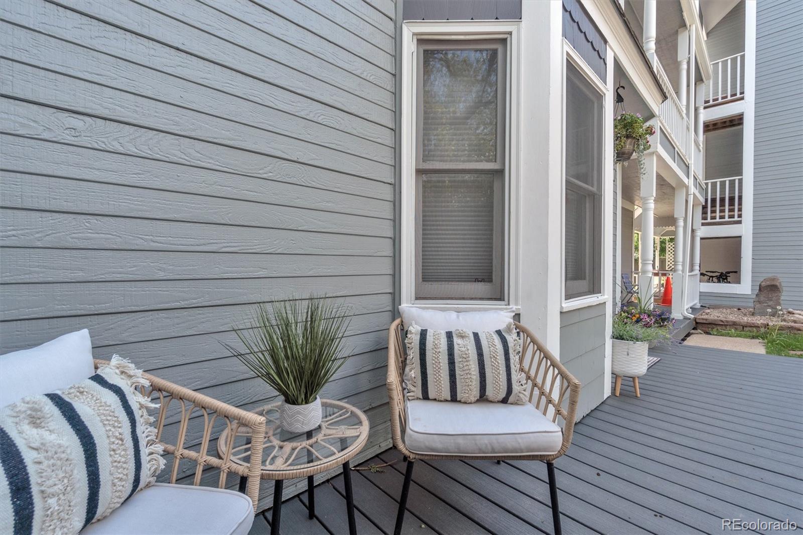 1430 18th Street, Unit 9 Boulder, CO 80302 - Photo 4 of 16 a view of a balcony with chairs