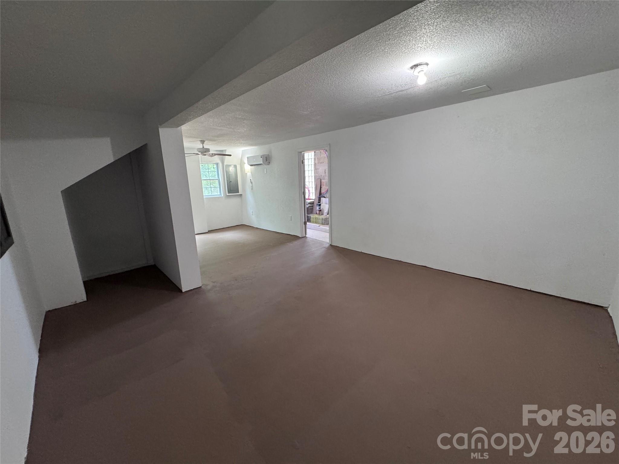 136 St John Zion Road Rutherfordton, NC 28139 - Photo 17 of 29 an empty room with windows and entrance