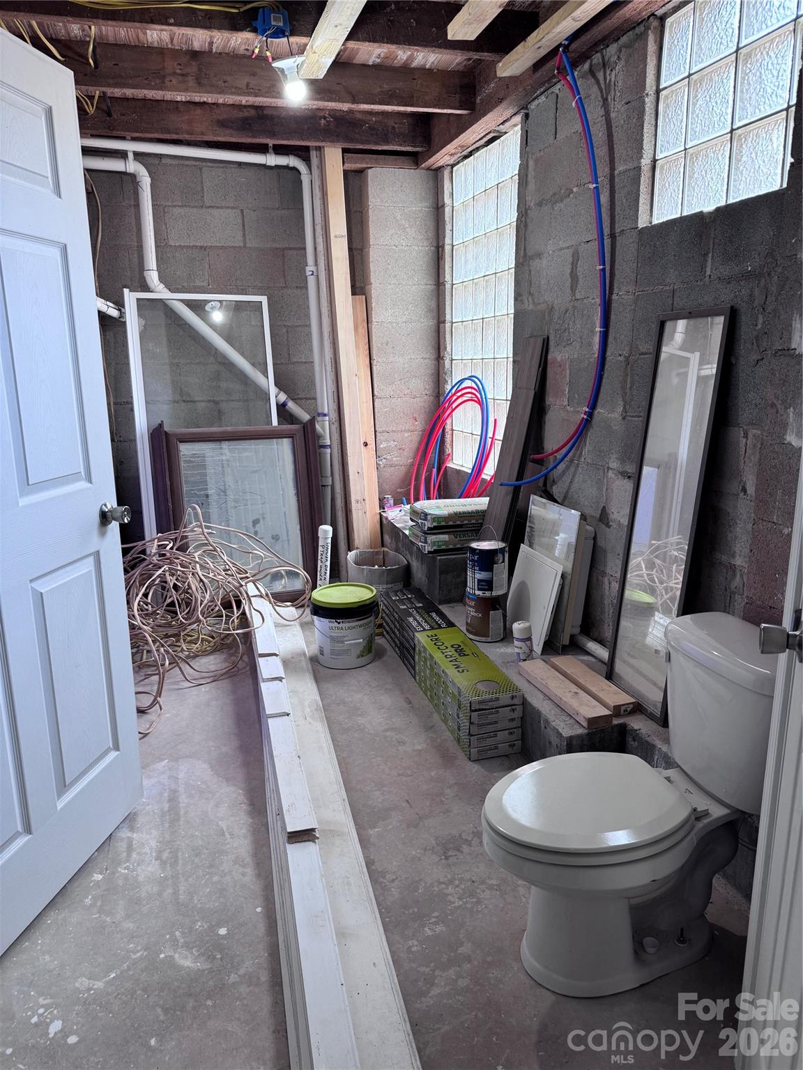 136 St John Zion Road Rutherfordton, NC 28139 - Photo 20 of 29 a bathroom with a toilet and a shower