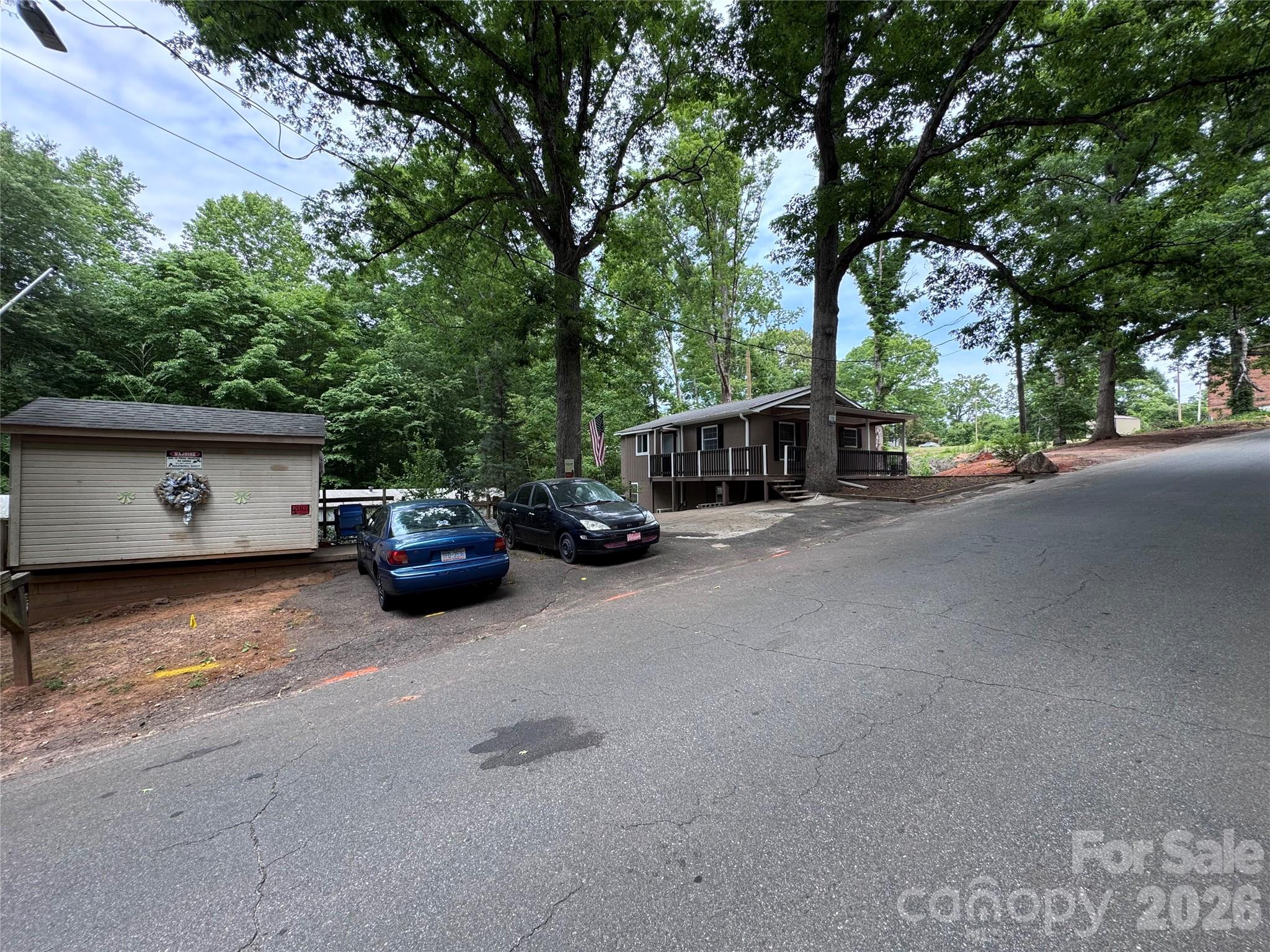 136 St John Zion Road Rutherfordton, NC 28139 - Photo 25 of 29 a view of a car parked in front of a house
