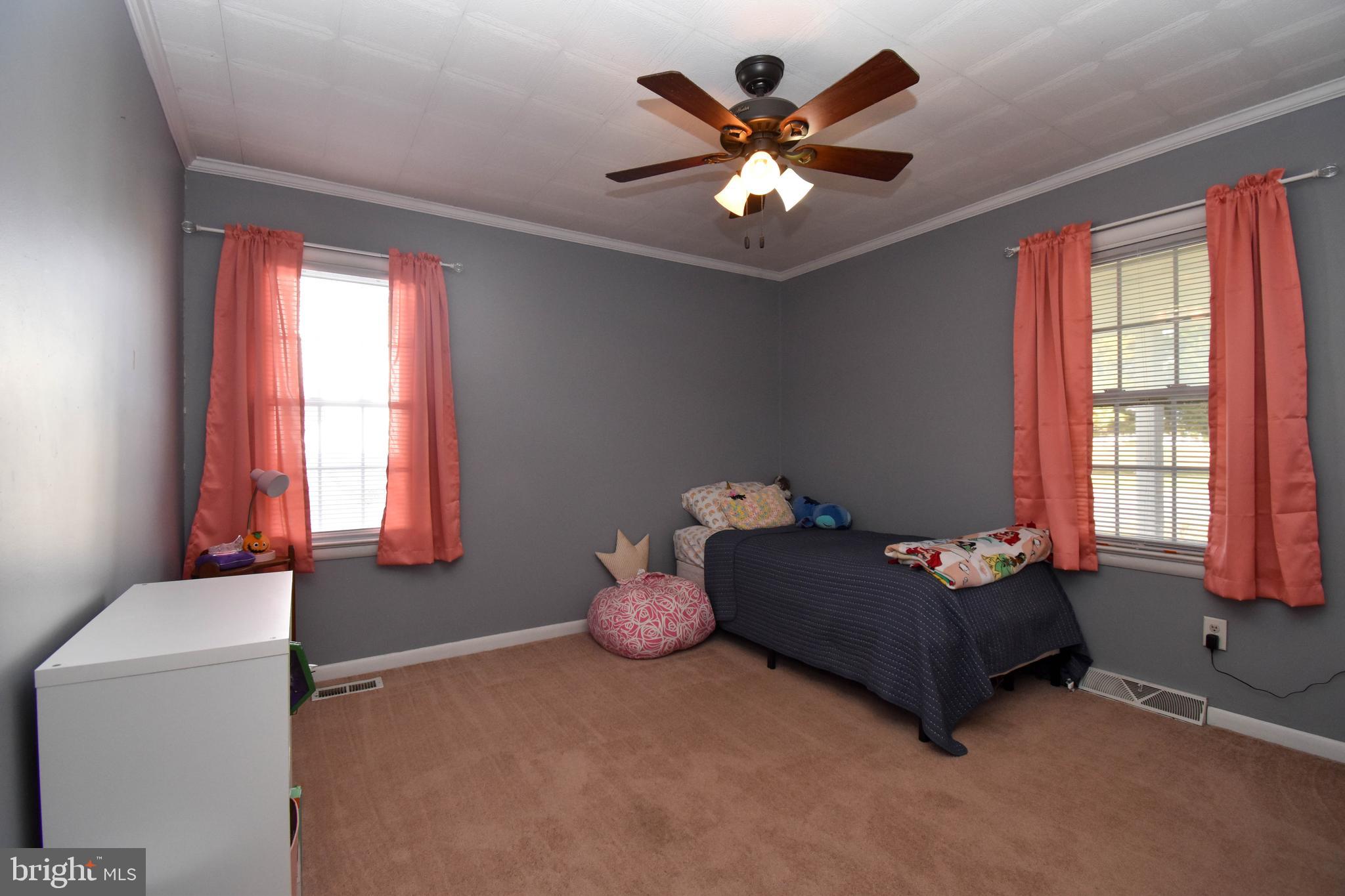 309 Robinson Street Georgetown, DE 19947 - Photo 16 of 26 a living room with furniture and a large window