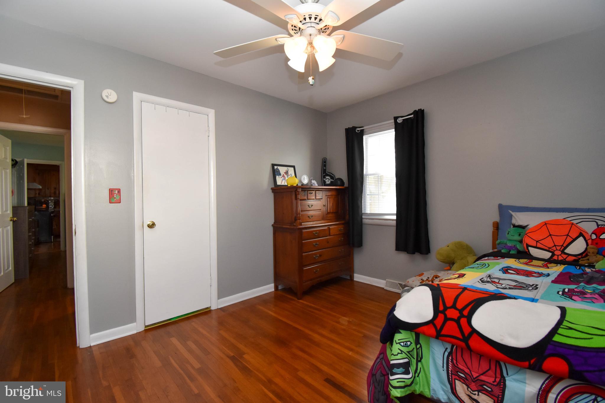 309 Robinson Street Georgetown, DE 19947 - Photo 19 of 26 a living room with furniture and a table