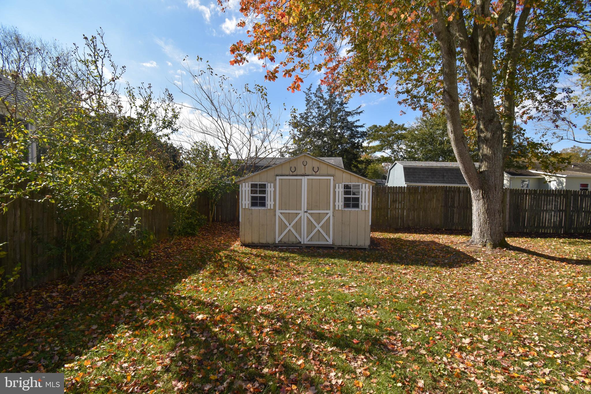309 Robinson Street Georgetown, DE 19947 - Photo 21 of 26 a view of a house with a yard