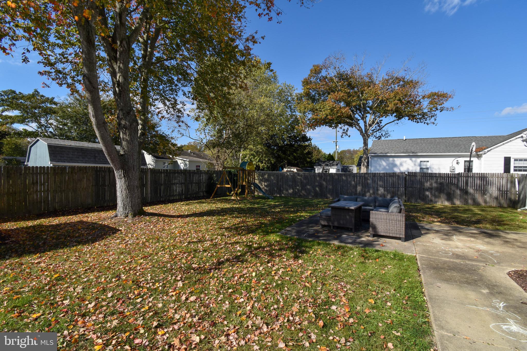 309 Robinson Street Georgetown, DE 19947 - Photo 22 of 26 a backyard of a house with lots of green space