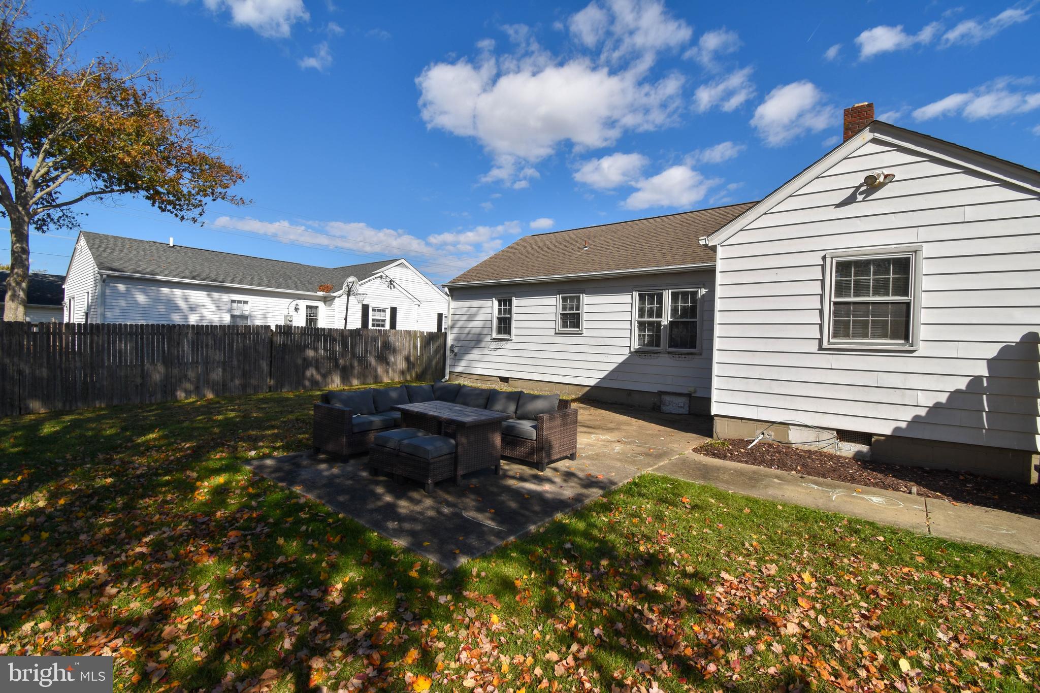 309 Robinson Street Georgetown, DE 19947 - Photo 23 of 26 a front view of a house with a yard