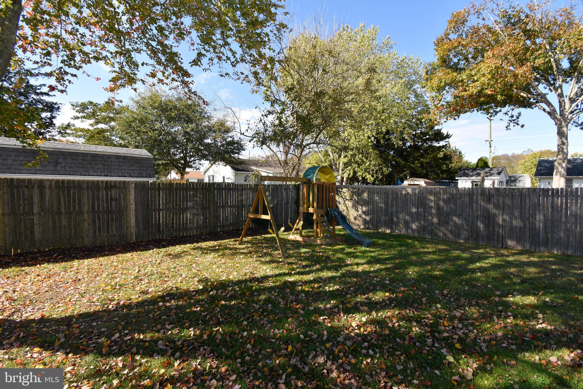 309 Robinson Street Georgetown, DE 19947 - Photo 24 of 26 a view of backyard with wooden fence