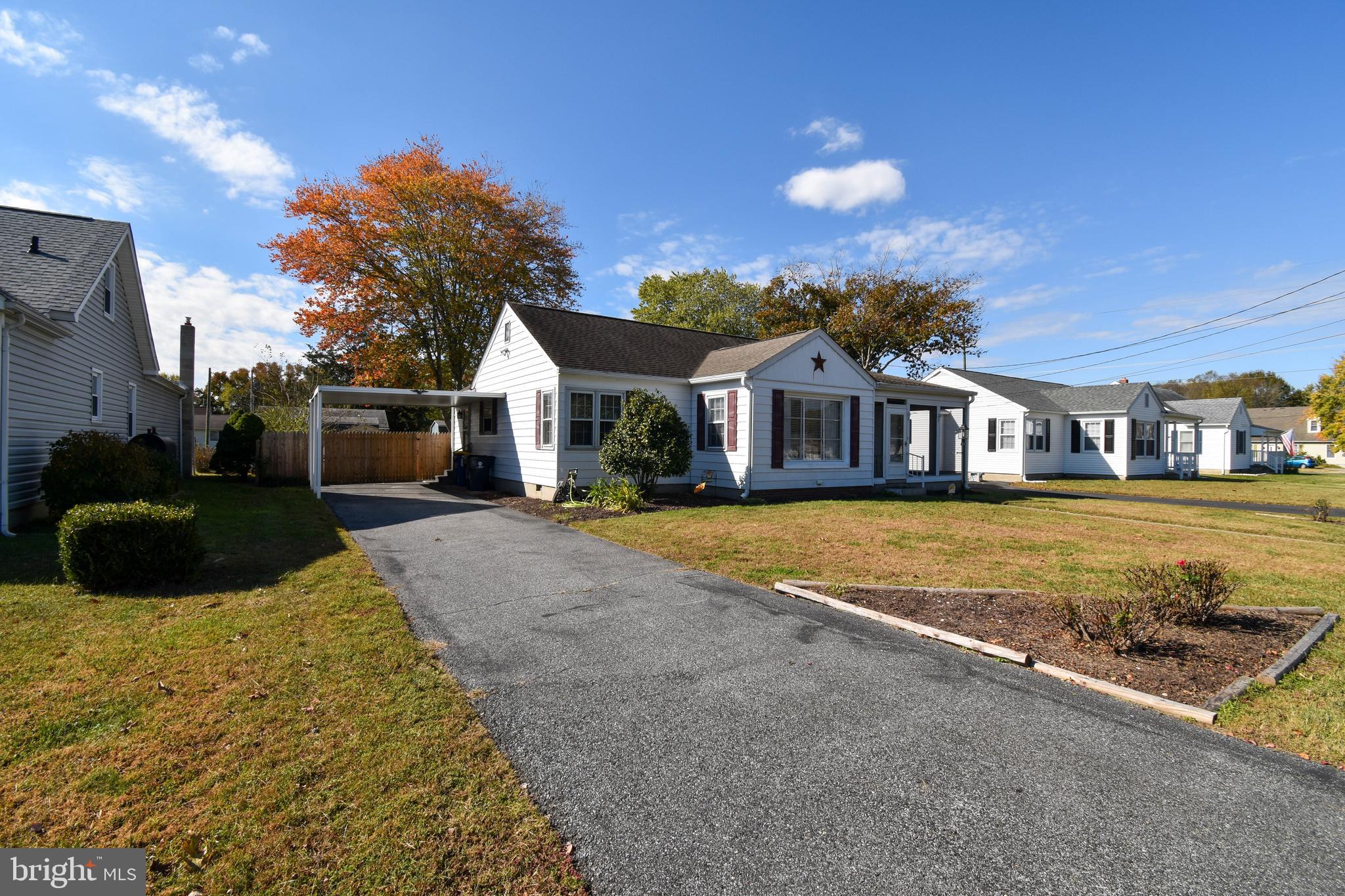 309 Robinson Street Georgetown, DE 19947 - Photo 25 of 26 a view of house with yard outdoor seating and city view