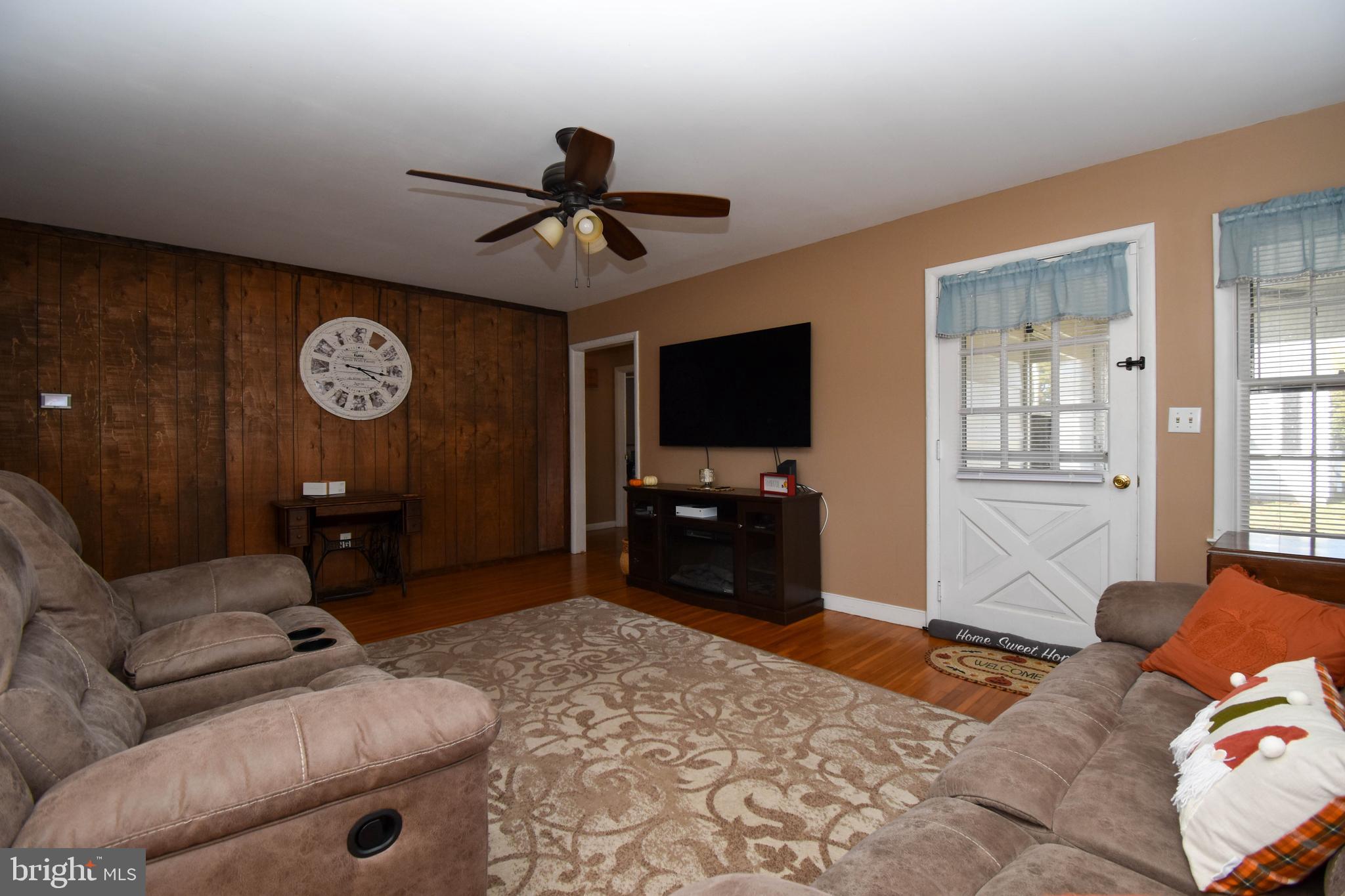 309 Robinson Street Georgetown, DE 19947 - Photo 6 of 26 a bedroom with a bed and a television