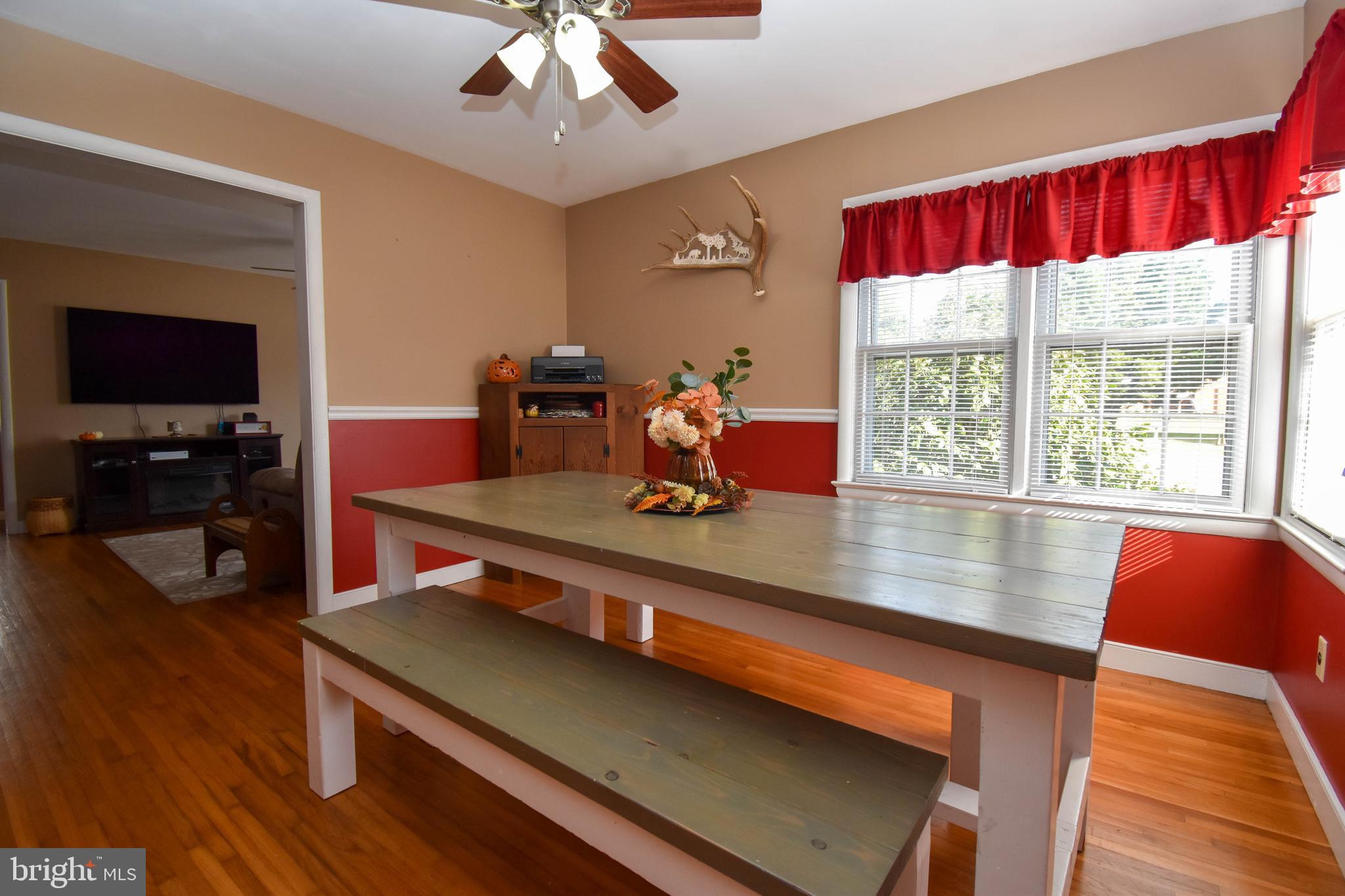 309 Robinson Street Georgetown, DE 19947 - Photo 8 of 26 a room with furniture pool table flat screen tv and wooden floor